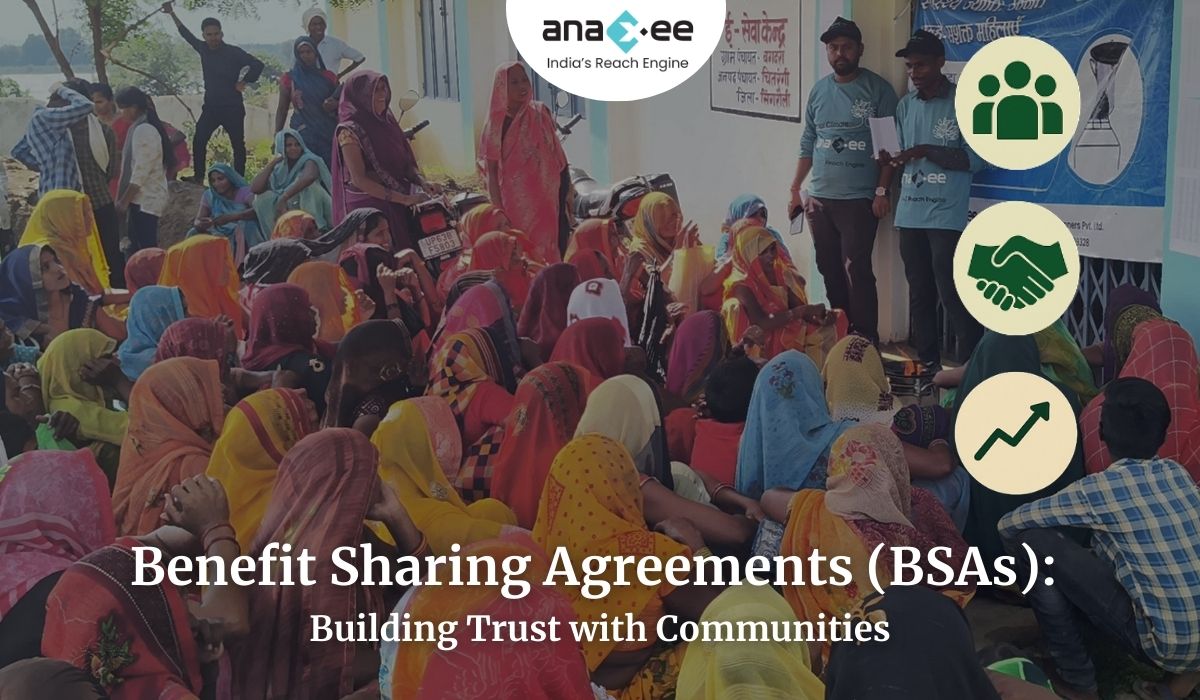 Community gathering in a rural setting with Anaxee facilitators engaging local people, symbolizing benefit sharing agreements that build trust and ensure fair distribution of carbon finance benefits.