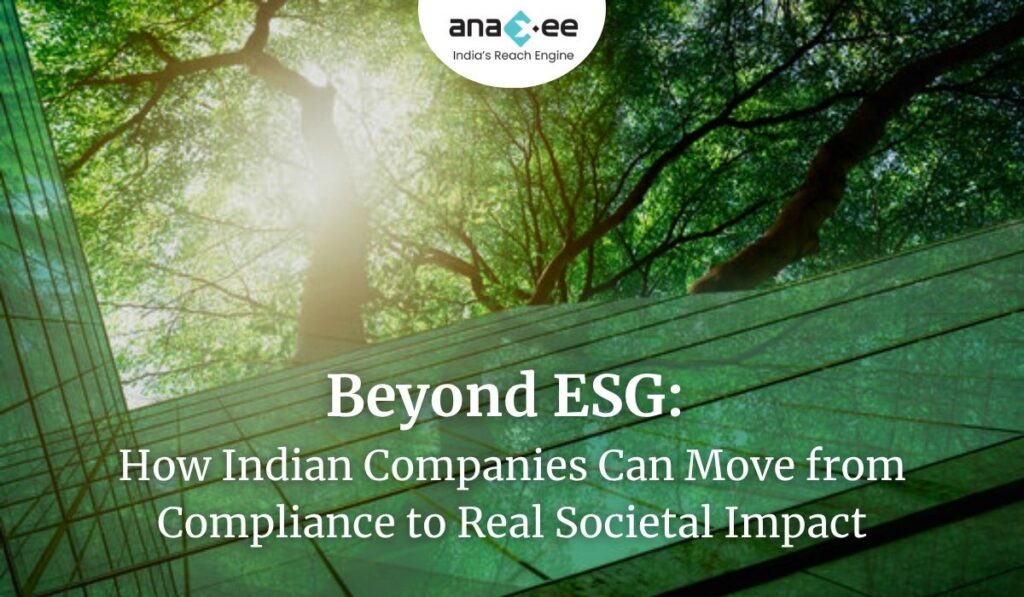A modern glass building reflecting green trees and sunlight, symbolizing sustainable business growth and environmental responsibility. Text overlay reads “Beyond ESG: How Indian Companies Can Move from Compliance to Real Societal Impact” with Anaxee’s logo on top.