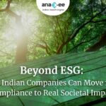 A modern glass building reflecting green trees and sunlight, symbolizing sustainable business growth and environmental responsibility. Text overlay reads “Beyond ESG: How Indian Companies Can Move from Compliance to Real Societal Impact” with Anaxee’s logo on top.