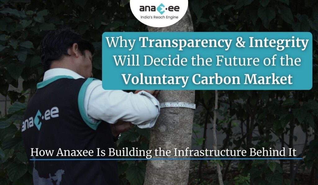Anaxee Digital Runners field staff measuring a tree while a highlighted text box overlays the image with the headline “Why Transparency & Integrity Will Decide the Future of the Voluntary Carbon Market” and a subtitle explaining Anaxee’s role in building climate infrastructure.