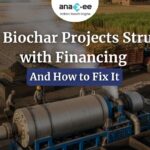 Workers operating a biochar production unit in a rural agricultural setting, with machinery processing biomass and producing biochar, illustrating the challenges and opportunities in biochar project financing.