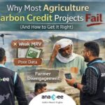 Anaxee field agents using digital tools while engaging with a farmer in an agricultural field, illustrating challenges in agriculture carbon credit projects.