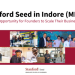 Banner showing Stanford Seed event in Indore featuring the headline about scaling businesses, with images of entrepreneurs, workshops, and business environments, along with Stanford Graduate School of Business branding.