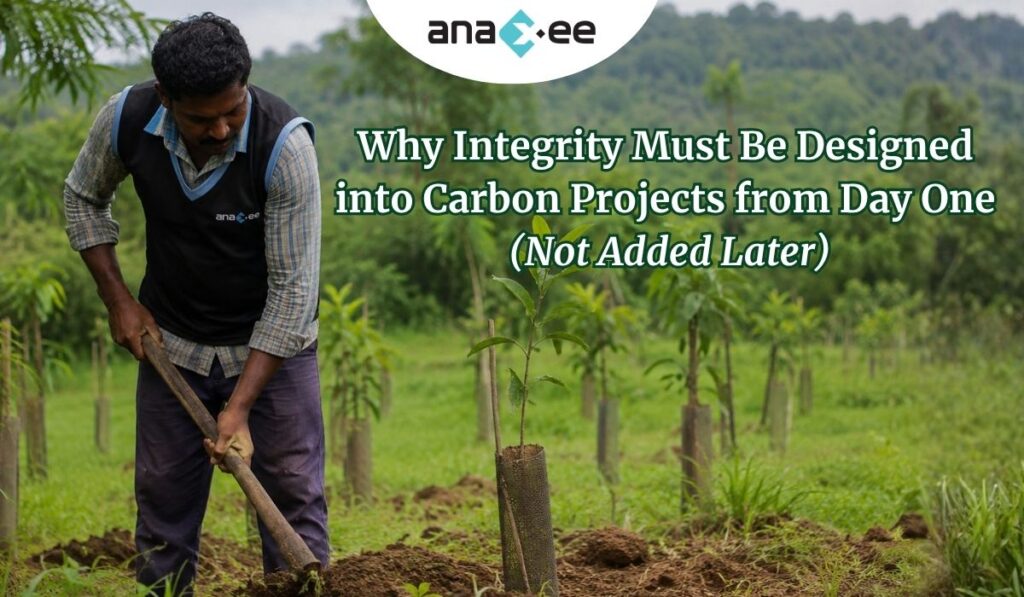 Indian field worker using digital-first plantation practices in a high-integrity carbon project with Anaxee field operations vest.