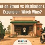 Distributor-led versus feet-on-street expansion in India — a delivery truck and field executive at one shopfront